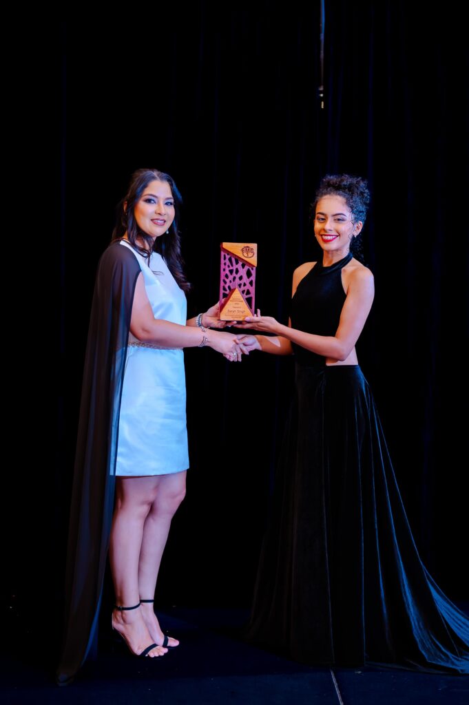 Sarah Singh receiving the Leadership Excellence Award