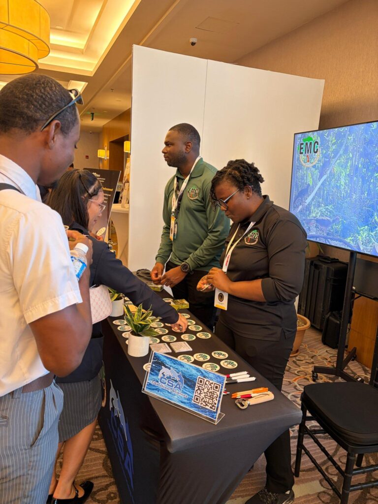 EMC Staff Interacting with Visitors during the Expo
