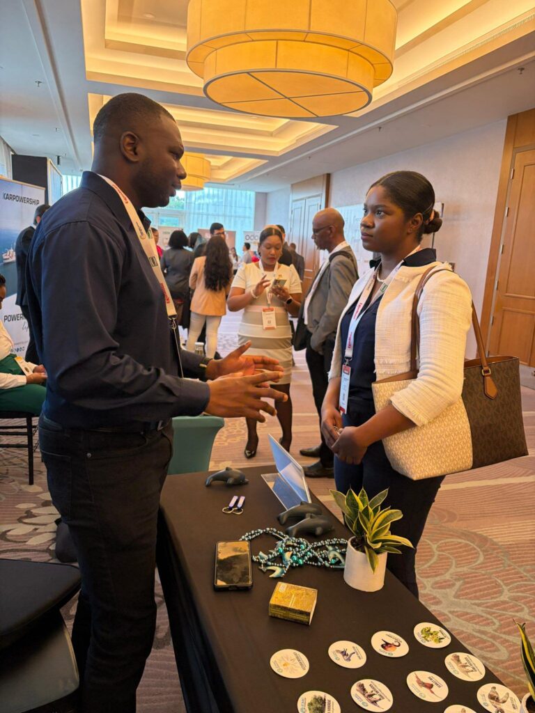 EMC Staff Interacting with Visitors during the Expo
